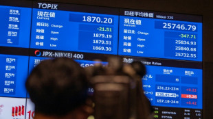 Asian markets mixed as traders consider China reopening 