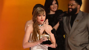 Taylor Swift wins record fourth best album Grammy at star-studded gala