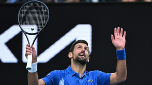 Record-setting Djokovic trumps Federer on way to Melbourne third round