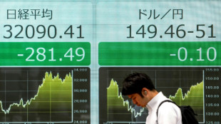 Global stocks edge higher but oil sinks