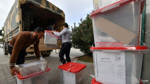 Tunisians to vote on toothless parliament in poll shunned by opposition