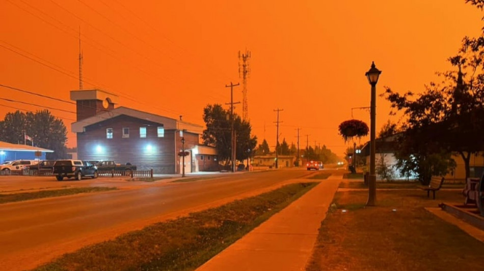 Military airlifts provide escape as wildfires sweep Canada's far north