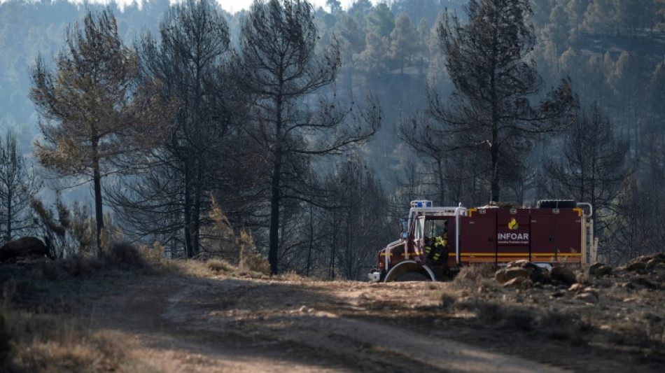 Firefighters gain on early Spain wildfire