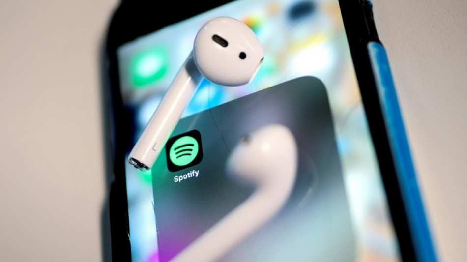 Spotify swings to profit as user numbers grow