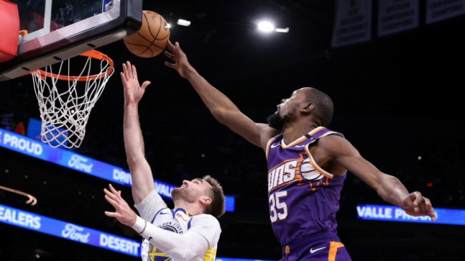 Durant and Booker lead NBA Suns over Warriors