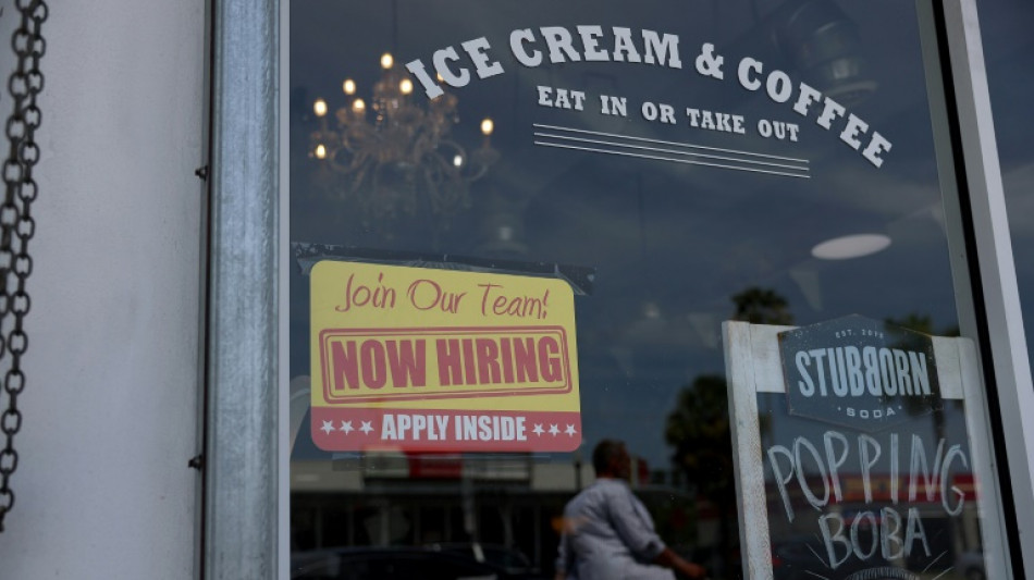 US hiring heats up unexpectedly in May but wage gains ease