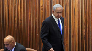 Netanyahu pauses judicial reform in strike-stricken Israel