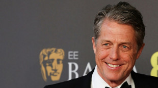 Hugh Grant settles lawsuit against UK tabloid publisher