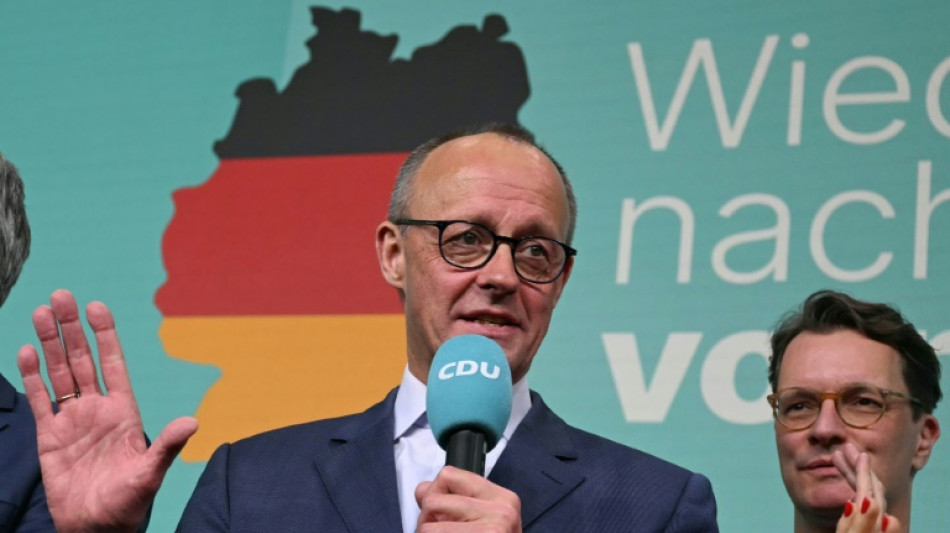 German vote winner Merz seeks to build govt as Europe waits