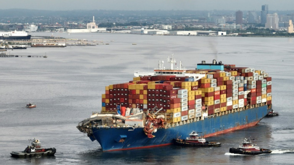 Cargo ship that destroyed Baltimore bridge towed to port