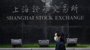 Asian markets mixed as traders await rate decisions