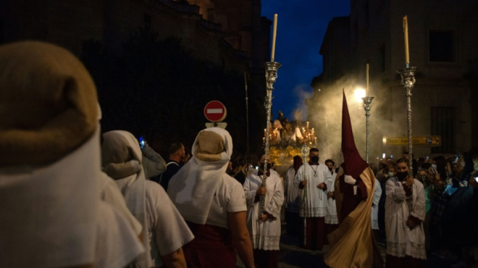 Women bear weight of Easter rite in changing Spain