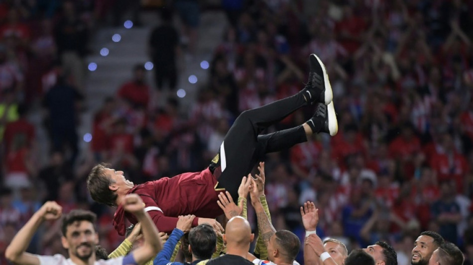 Suarez bids Atletico farewell as Sevilla qualify for Champions League