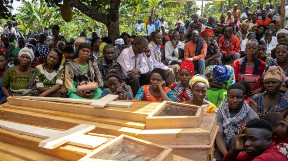 Uganda arrests 20 'collaborators' over horrific school massacre