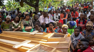 Uganda arrests 20 'collaborators' over horrific school massacre