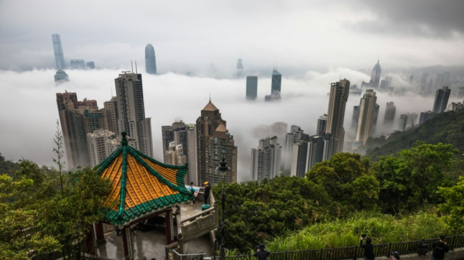 Hong Kong's top scientsts urge shift from Beijing's zero-Covid