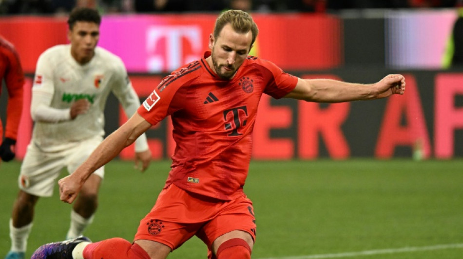 Kane hat-trick sends Bayern eight points clear