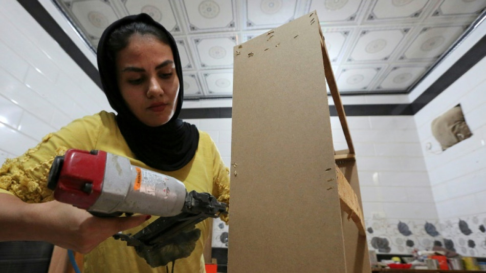 'But you're a woman': Iraqi furniture-maker carves up stereotypes