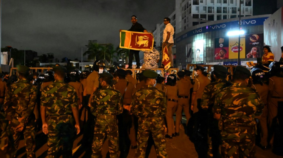 Crisis-hit Sri Lanka hikes rates as protests spiral