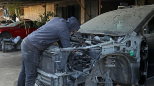 Cash-strapped Lebanese soldiers moonlight as mechanics, waiters