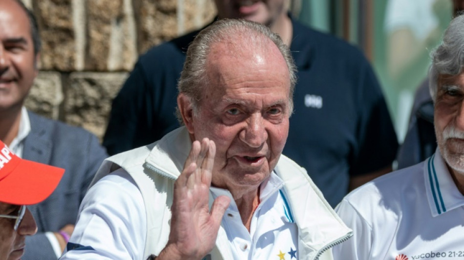 Spain's ex-king attends regatta on brief visit home