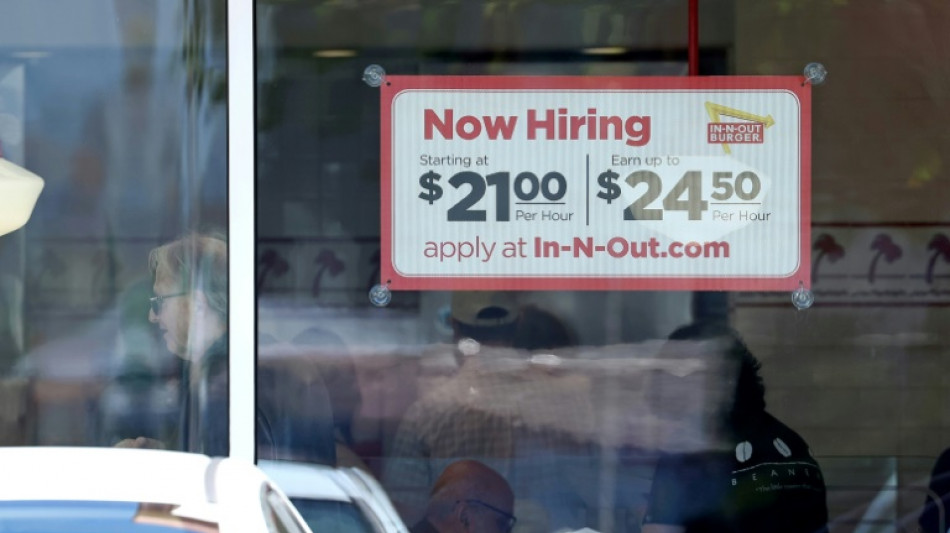 US unemployment ticks down as hiring accelerates