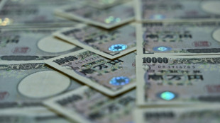 Yen swings after Bank of Japan policy tweak, Asian equities mixed