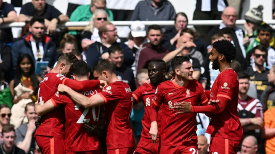 Liverpool pile pressure on City as Norwich are relegated