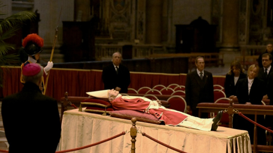 Thousands pay tribute to ex-pope Benedict at lying-in-state