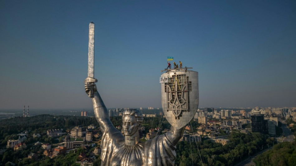 Ukraine puts trident in place of Soviet emblem on tallest statue