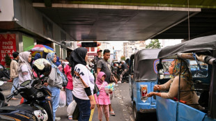 Indonesian single mom makes ends meet as autorickshaw driver