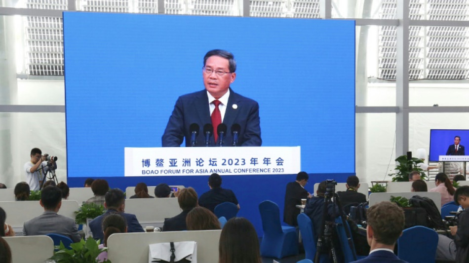 China's economy showing 'strong momentum', says Li