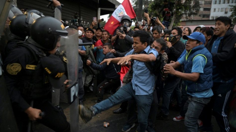 Peru police clash with protesters demanding president step down