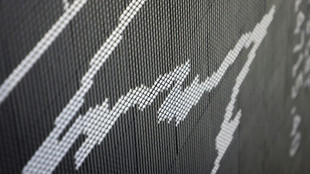 Markets mixed as sluggish debt talks worry investors