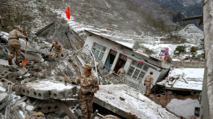 Race to find dozens trapped in southwest China landslide