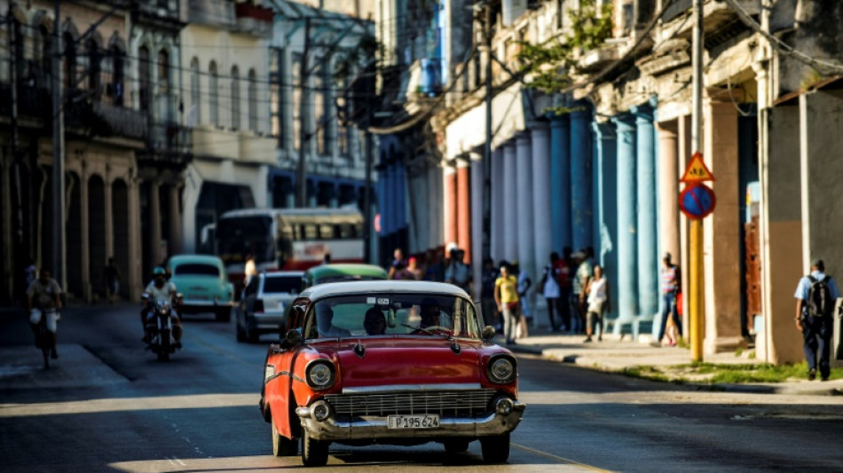 Cuba puts state-owned car owners on commuter aid duty