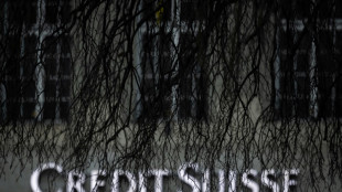 Stocks drop despite Credit Suisse buyout, central banks' pledge