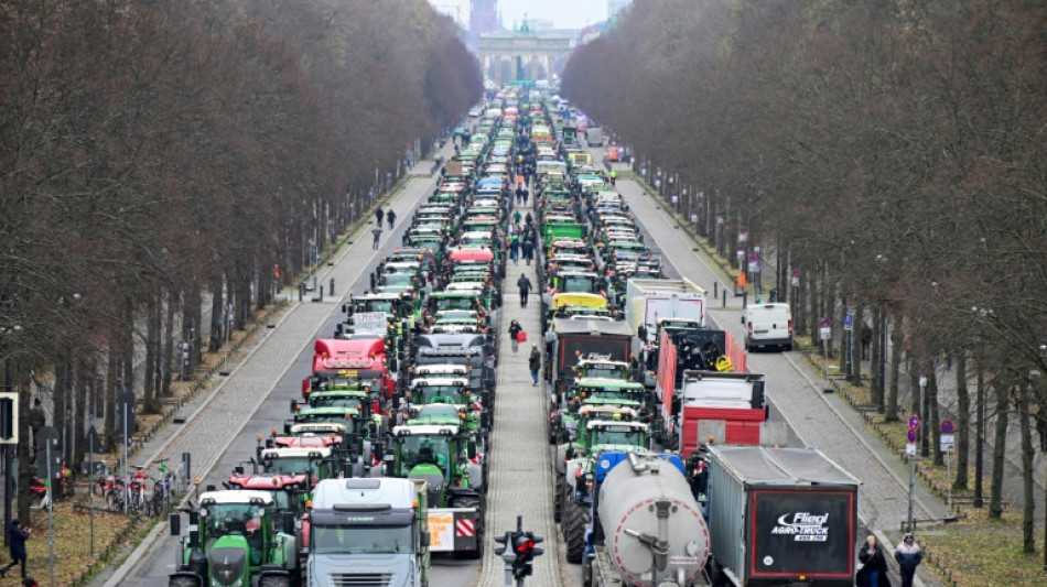 Farmers clog Berlin with tractors in protest at cuts