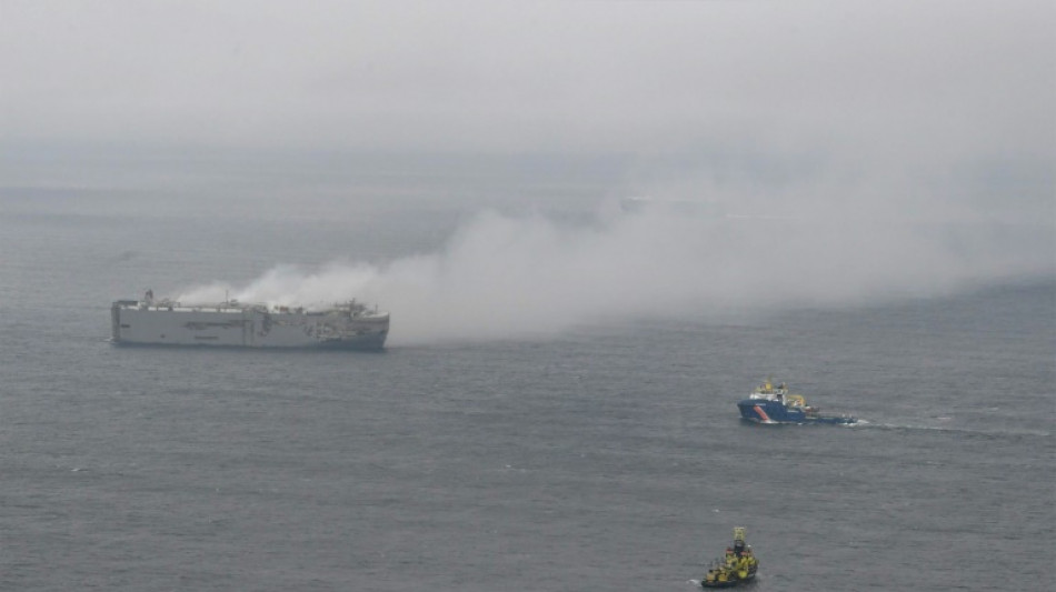 Ship blaze off Dutch coast losing 'intensity'