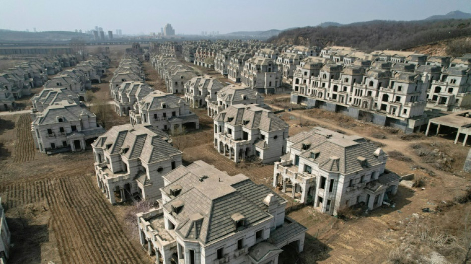 Chinese ghost town of mansions reclaimed by farmers 