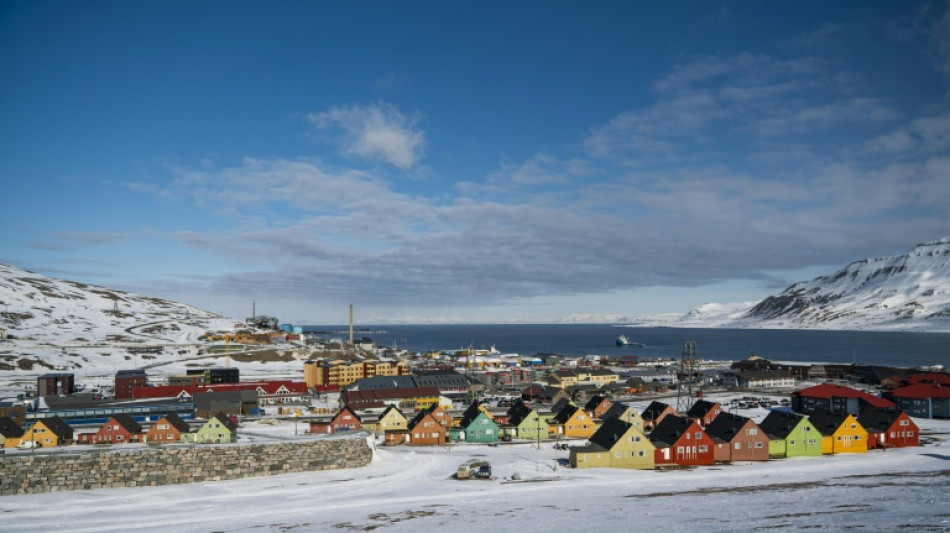 Warming climate upends Arctic mining town