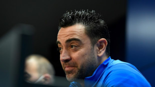 Xavi says Barcelona's 'doors are open' to Messi