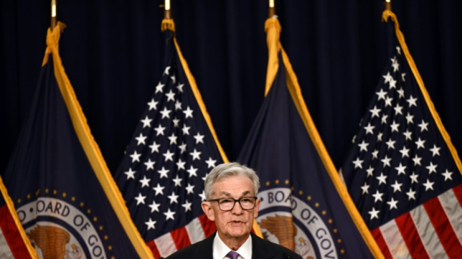 US Fed holds key rate steady and signals three cuts likely in 2024