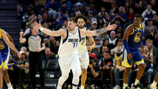 Doncic triple-double leads Mavs over Warriors in record duel 