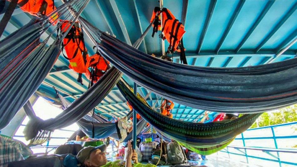 Indigenous people free tourists taken in Peruvian Amazon