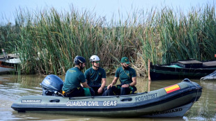 Spain's grim search for flood missing moves to coast