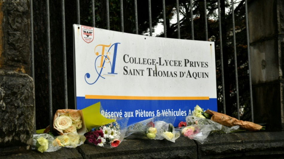 Minute of silence for slain teacher in southwest France