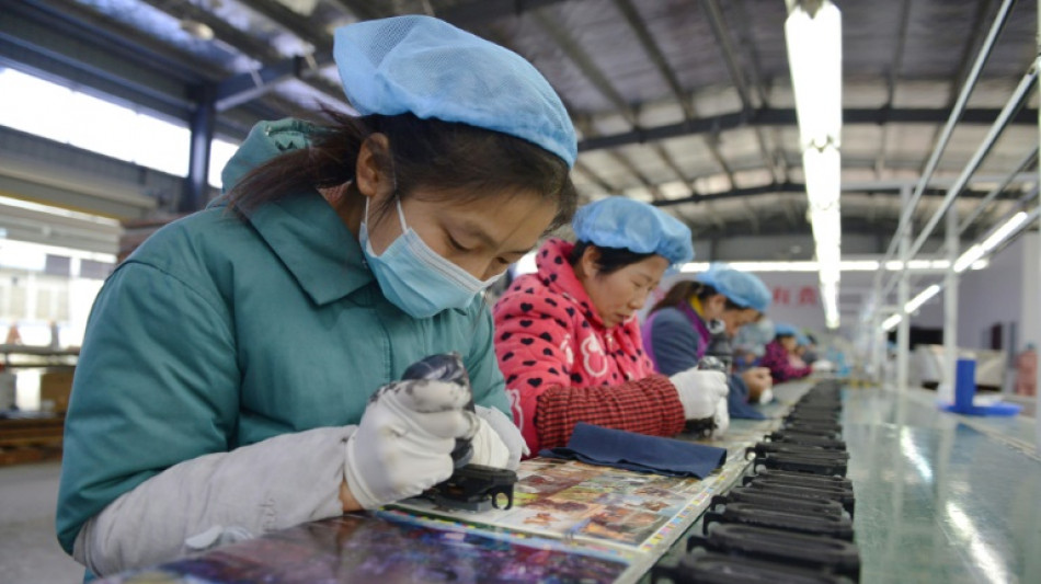 China's factory activity contracts as Covid disruptions spread