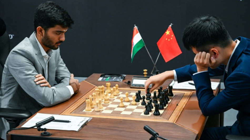 World chess champ Ding, teen challenger tied past halfway mark