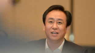 Police hold boss of troubled developer China Evergrande: report